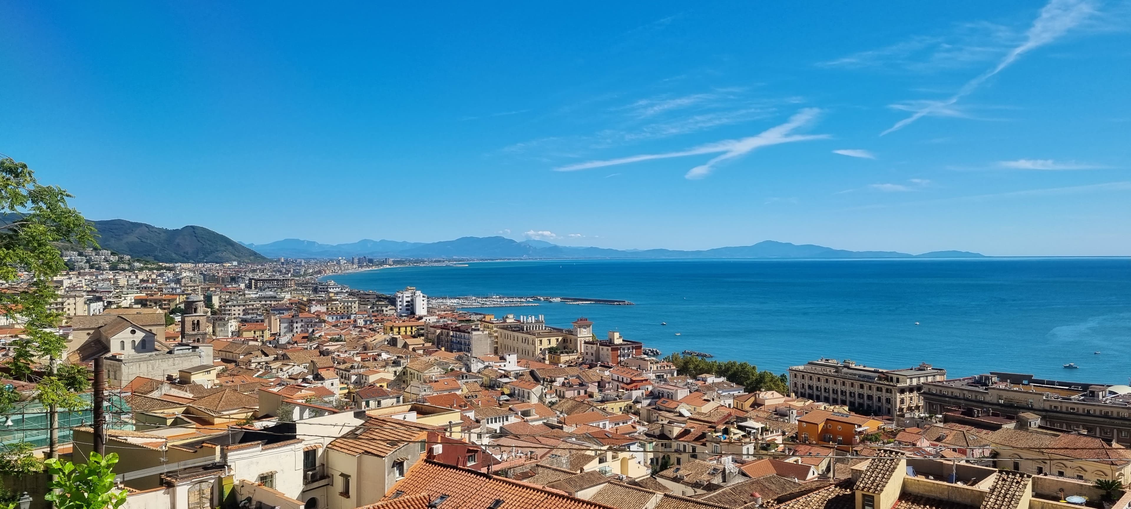 Photo: Cabalist12, CC BY-SA 4.0, via Wikimedia Commons (https://commons.wikimedia.org/wiki/File:Panorama_of_salerno_from_arechi.jpg)