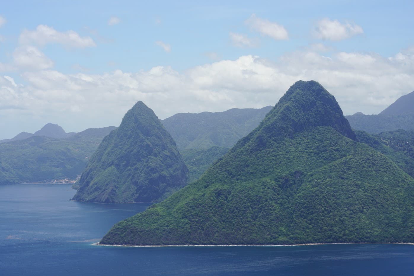 Photo: Caribbeandy, CC BY-SA 4.0, via Wikimedia Commons (https://commons.wikimedia.org/wiki/File:Pitons-aerial.jpg)